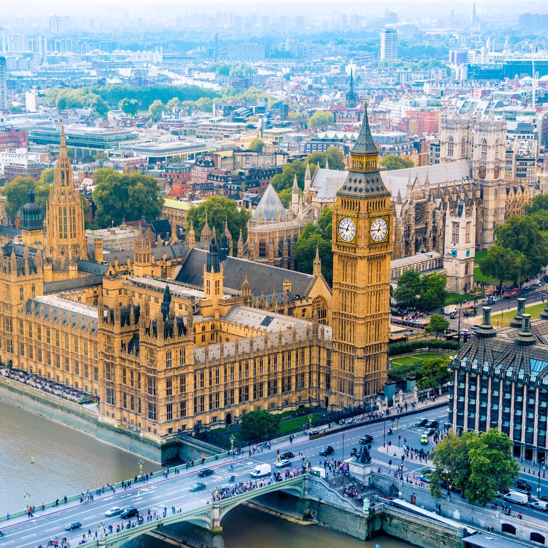 Palace of Westminster and Big Ben overlooking the Thames in London, a premier private jet charter destination.